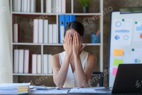 Preview: Portrait thoughtful confused young asian businesswoman looking at laptop. Stress while reading news
