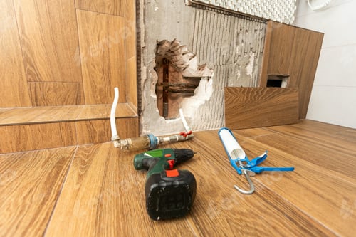 Preview: hole into the inside wall and heating pipes