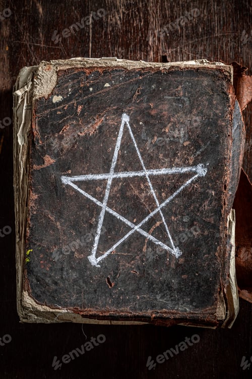 Preview: Vintage thick book with a pentagram symbol