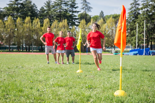 Preview: Football players training in soccer field