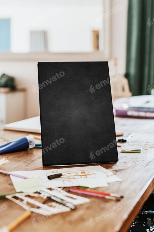 Preview: Blank chalk board on wooden table