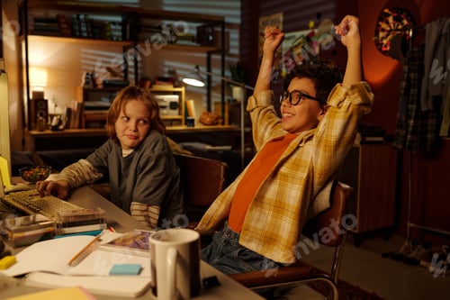 Preview: Excited Children Celebrating Gaming Victory Indoors