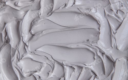 Preview: Clay texture spa mask for face and body. Selective focus.