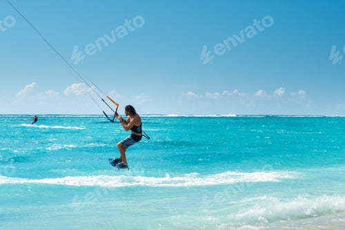 Preview: A man paragliding on Le Morne beach, Mauritius, Indian ocean on the island of Mauritius
