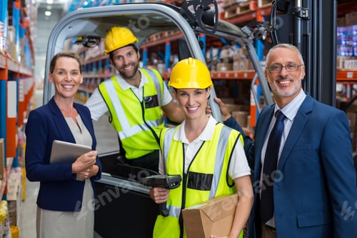 Preview: Warehouse manager and client standing with co-workers