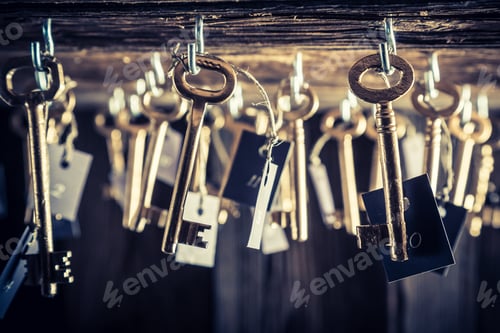 Preview: Closeup of vintage keys with number in hotel