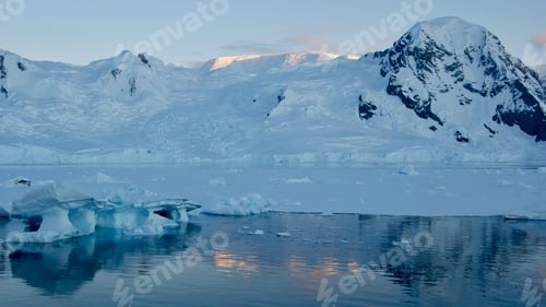 Preview: Icy Antarctic landscape with glacier and ocean reflection