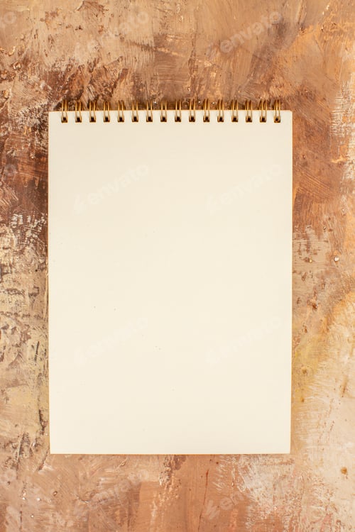 Preview: top view open notepad with clean empty blanks on a light background photo copybook color pen school