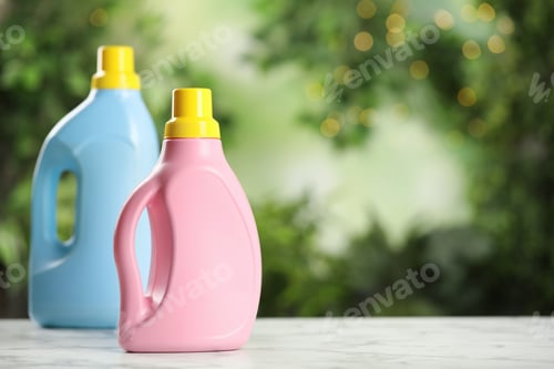 Preview: Detergents on white marble table outdoors, space for text