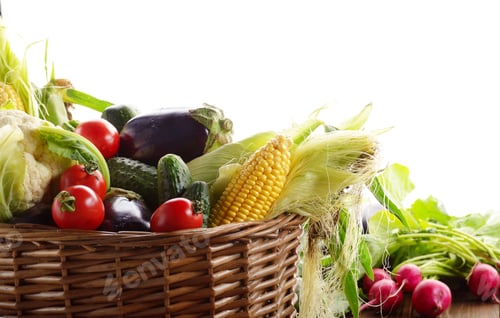 Preview: Organic vegetable food ingredients in the basket on white backgr