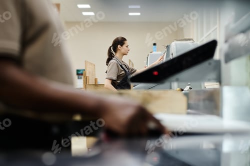 Preview: People Working In Print Shop