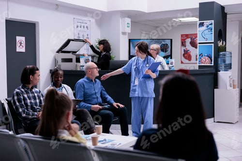 Preview: Professional nurse taking older patient to see doctor for clinic appointment