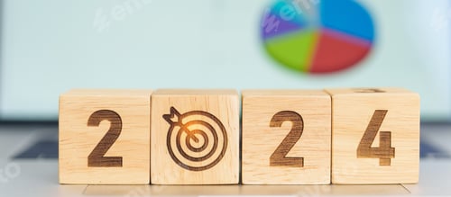 Preview: 2024 Year block with dartboard icon against computer