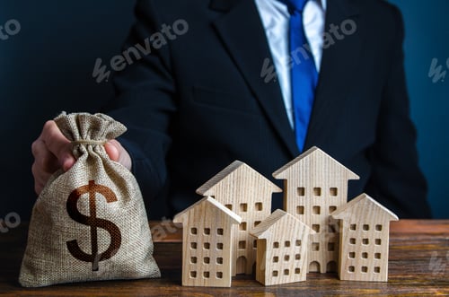 Preview: A businessman puts a dollar money bag near the houses.
