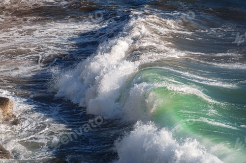 Preview: Ocean wave background breaking sea water rocky shore