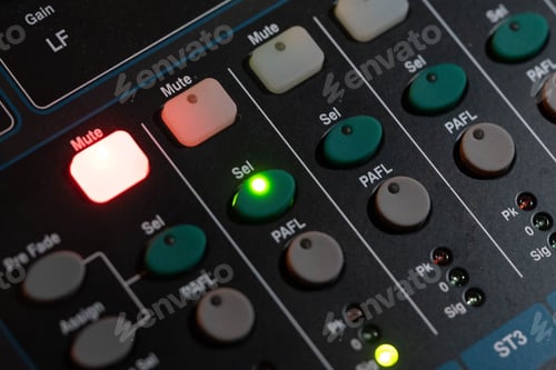 Preview: Closeup of buttons on an audio mixing device
