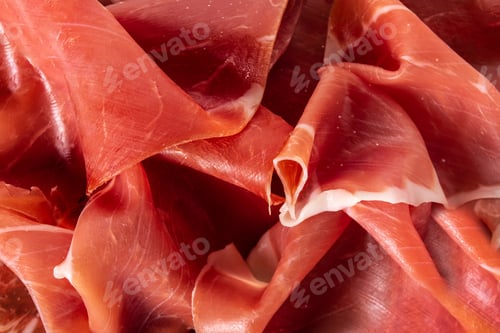 Preview: Spanish serrano ham on cutting board