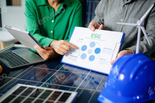 Preview: Professionals analyzing solar panels with ESG reports, showcasing clean energy, renewable power,