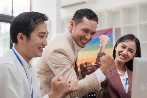 Preview: Asain business team Happy to be successful partnership teamwork achieved the desired goal