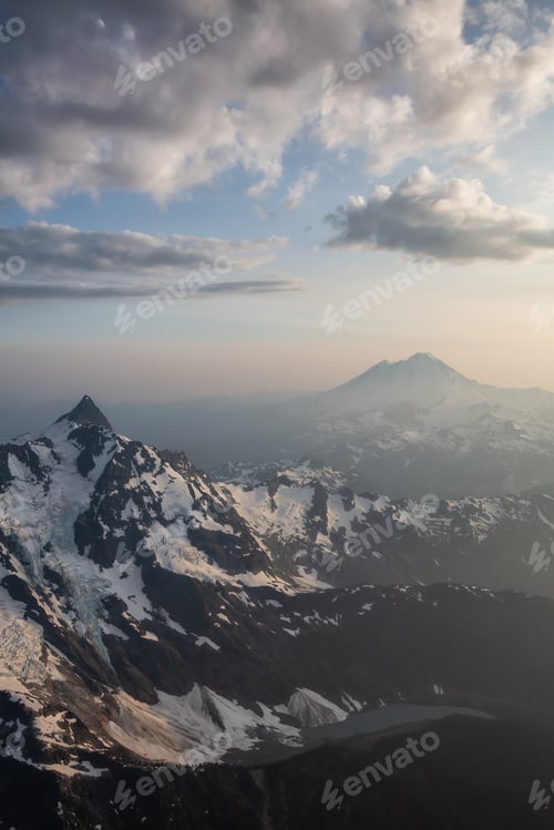 Preview: Aerial landscape view of the rugged mountain peaks with Mount Baker in the background