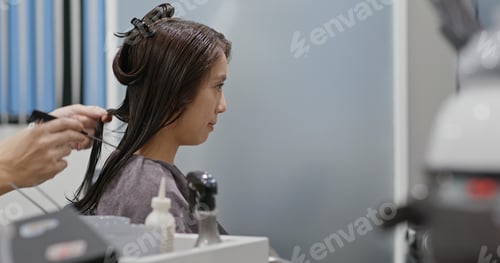 Preview: Asian woman with hair coloring in process