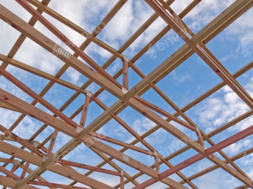 Preview: Roof frame construction under cloudy blue sky