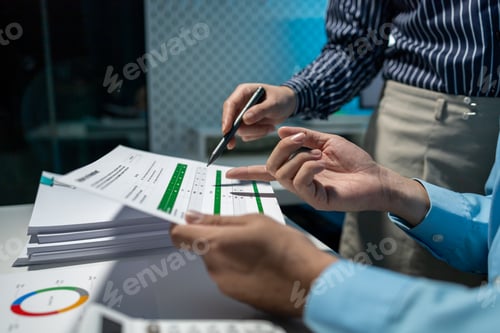 Preview: using computer together in office, successful business people working together in a co-working offic