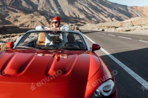 Preview: Carefree woman traveling by car