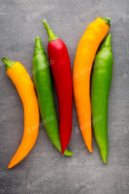 Preview: Chilli pepper on the grey background.