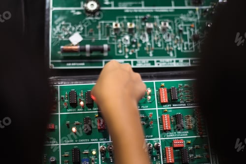 Preview: motherboard with kids hand touching