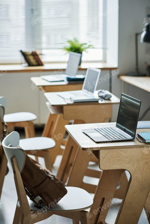 Preview: Standing Desks in Classroom with Laptops Open