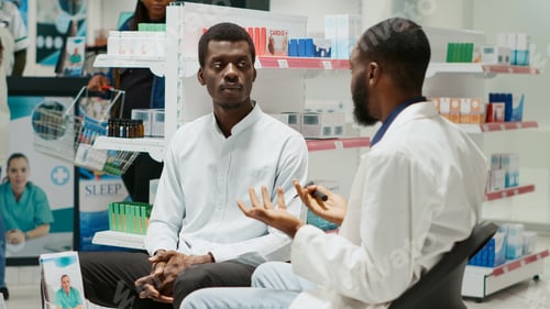 Preview: Health specialist using otoscope to do ear examination