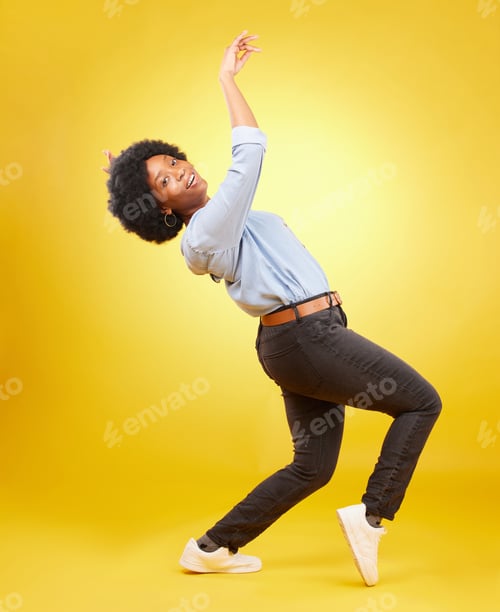 Preview: Portrait, dance and black woman with energy, celebration and freedom against a studio background. F