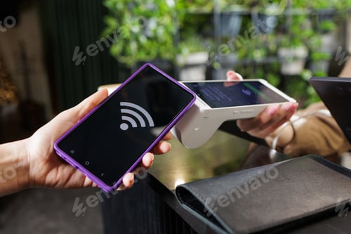 Preview: Phone Tap to Pay with NFC at Retail Counter Using Portable POS Reader