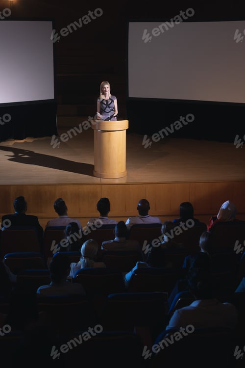 Preview: Speaker Presents to Audience at Corporate Event