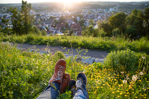 Preview: Couple enjoy beautiful city view in the sunset