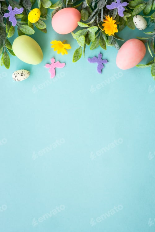 Preview: Easter background with Eggs, butterflies and spring flowers at blue.