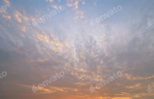 Preview: Sunset sky. Abstract nature background. Dramatic blue and orange, colorful clouds at twilight time.