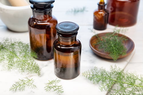 Preview: Fennel essential oil on amber bottles