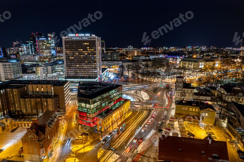 Preview: Aerial view of Tallinn, Estonia, with the Viru Circle in the city center, illuminated at night