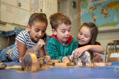 Preview: Kids enjoying playtime with wooden animals on a sunny classroom afternoon