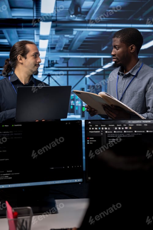 Preview: Supervisor talking with workers in server room, asking about systems bottlenecks