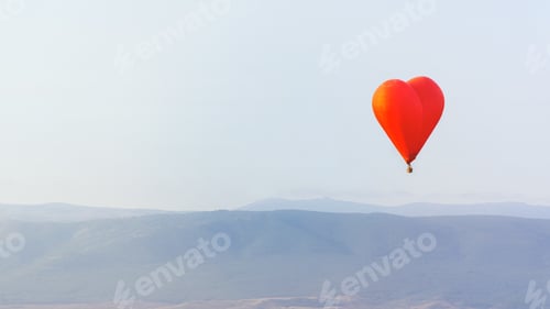 Preview: Flying a balloon in the shape of a heart.