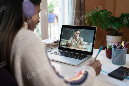 Preview: Student Learning Online with Teacher on Computer Screen