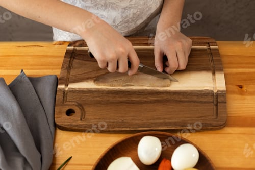 Preview: Preparation of salad from boiled vegetables, eggs and fish.