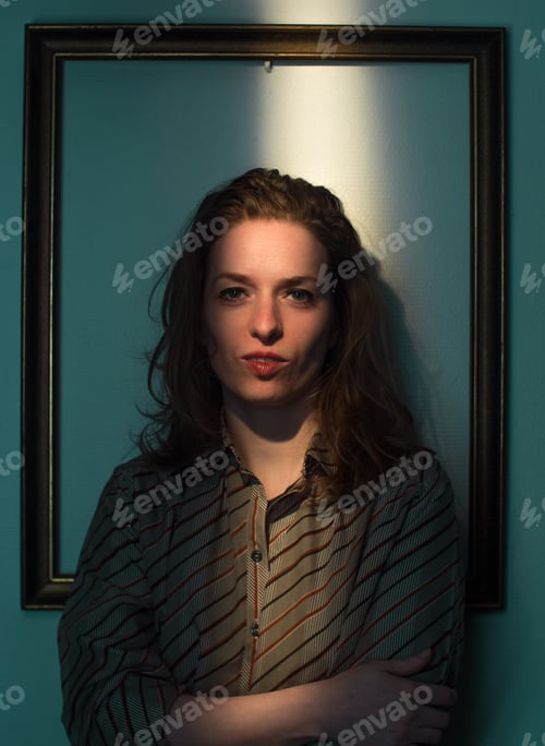 Preview: expressive caucasian female portrait,framed in frame