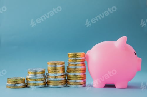 Preview: A concept image of children or family home finance and savings with piggy bank and copy space
