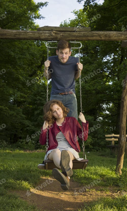 Preview: Cute Girl And Boy, On A Swing, Funny Face Expressions.