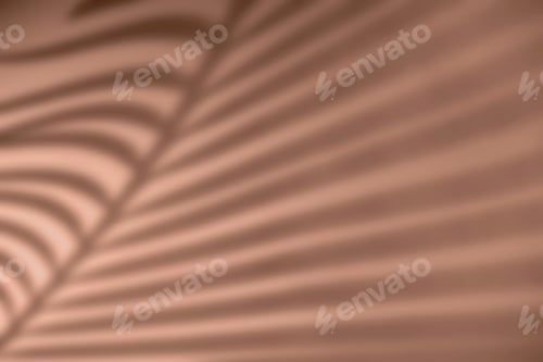 Preview: Shadow of palm leaf on natural earthy mocha mousse color background