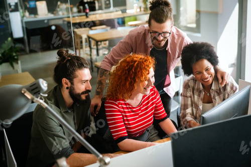 Preview: Mixed team of software engineers brainstorming ideas. Diverse app developers collaborating as group